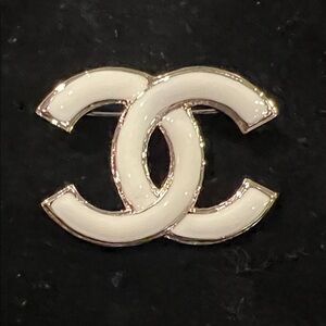 CHANEL Cream and Gold Interlocking C Brooch